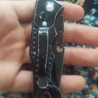چاقو خوش دست با دکمه باز میشه