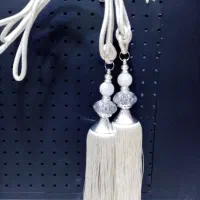 گل پرده و شرابه کنار پرده