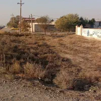 زمین مسکونی چهار دیواری بهر جاده اصلی