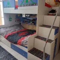 تخت خواب دو طبقه با کمد کشو فراوان