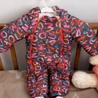 کاپشن، کلاه و رخت خواب نوزادی