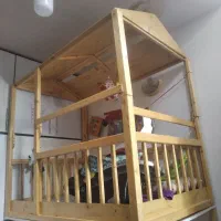 تخت چوبی دو طبقه