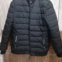 کاپشن مردانه  و پالتو زنانه