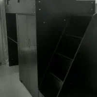 تخت دو طبقه با کمد میز و کشو