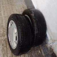 یک عدد لاستیک و ۲عدد رینگ همراه با قالپاق