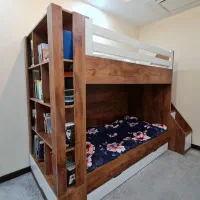 تخت دو طبقه به همراه کتابخانه از برند دکوچید