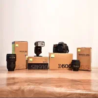 دوربین نیکون با دو لنز و فلاش Nikon