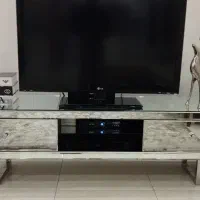 میز تلویزیون آینه ای با ساعت ست