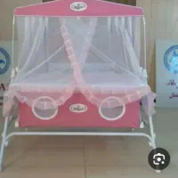 گهواره میلاد صورتی