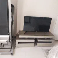 تی وی سامسونگ با میز پازلی در حد نو بعلت مهاجرت