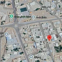 زمین مسکونی ۴۰۰ متری دیوار کشی شده و سند تک برگ