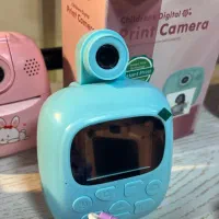 دوربین فیلمبرداری و عکاسی همراه با پرینت فوری عکس