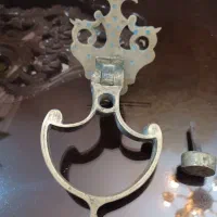 بکوب درب برنجی یکصد ساله با نقش