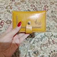 فروش کیف چرم طبیعی ۱۸کارتی قیمت یک میلیون و هشتصد.