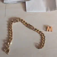 دستبند طلا کارتیه همراه با پلاک