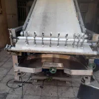 کردبر پهن کن نان تافتون