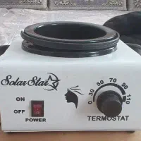 موم گرم کن قابلمه ای