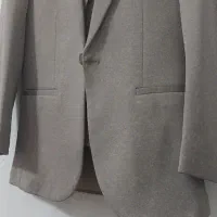 یک دست کت وشلوار در حد نو وتازه استفاده شده