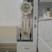 ساعت ایستاده و شمعدان