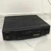 دستگاه ویدیو قدیمی ایوا و عینک سه بعدی