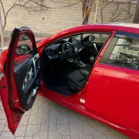 فروش مزدا سه هاچ بک قرمز|خودرو سواری و وانت|تهران, گلستان (شهرک راه آهن)|دیوار