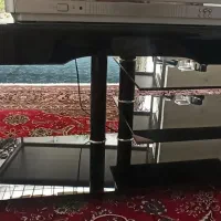 زیر تلویزیونی شیشه ای