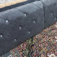 پشتی دونه ای یک تومن  رنگ طوسی و کرمی