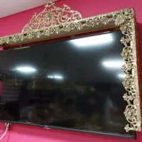 قاب میز تلویزیون دیواری طرح برنزی برنجی