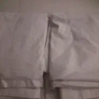 دوعدد زیرپرده شیری نواردوزی و پارچه کاملا سالم