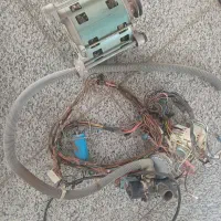 موتور و تایمر و سایر لوازم ماشین لباسشویی حایر