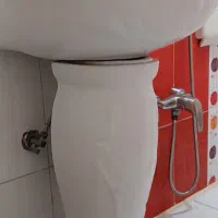 روشویی همراه با شیر قهرمان و آینه