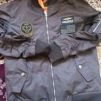 کاپشن خلبانی. معاوضه با لباس