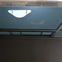 میز تلویزیون و کفش چرم