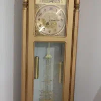 ساعت ایستاده طلایی