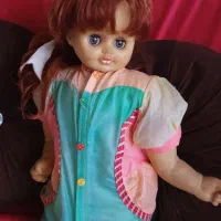 عروسک مو قرمز