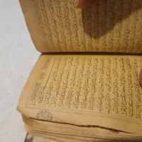 قرآن عتیقه قدیمی روکش چرم