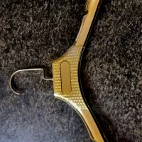 چوب لباسی طلای