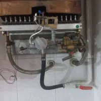 سرویس آبگرمکن دیواری و لوله کشی آب سرد و گرم