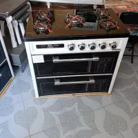 اجاق گاز طرح فر  صفحه شیشه ای نو آکبند
