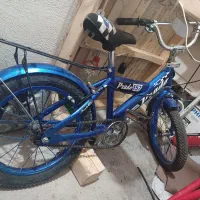 دوچرخه ۱۶ ابی و ۲۴ قرمز