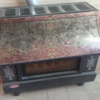 بخاری گازی طرح شومینه