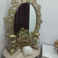 اینه ویک جفت شمعدان برنجی مناسب تازه عروس داماد