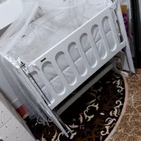 تخت گهواره ای کودک