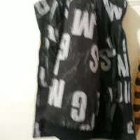 کاپشن|لباس|قم, شهید رجایی|دیوار