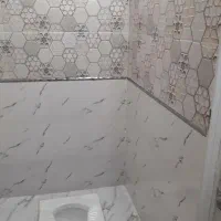 کاشی کاری و انجام کارهای ساختمانی