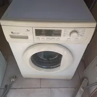 تعمیرات انواع لباسشویی اتومات در منژل