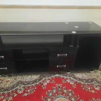 زیر تلویزیونی شیشه ای چهار کشویی