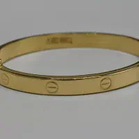 دستبند کارتیر لاو بدون اجرت فقط ۴ درصد/طلای فتحی
