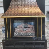 بخاری شومینه دوشعله چدنی اصل گلکاران اصفهان