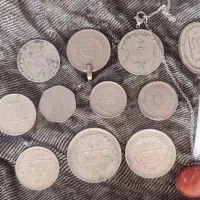 سکه شاهی با سه تا گردنی یک جا